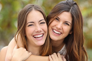 Women after seeing Aetna dentist in Shorewood