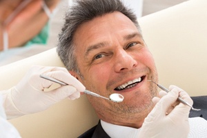 Man in dental chair at dentist in Shorewood getting dental crown