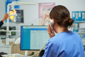 Dental team member talking on phone