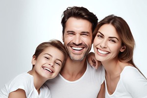 Parents and child with happy, healthy smiles