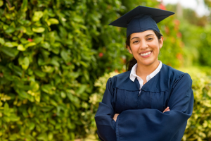 a graduating student smiling brightly